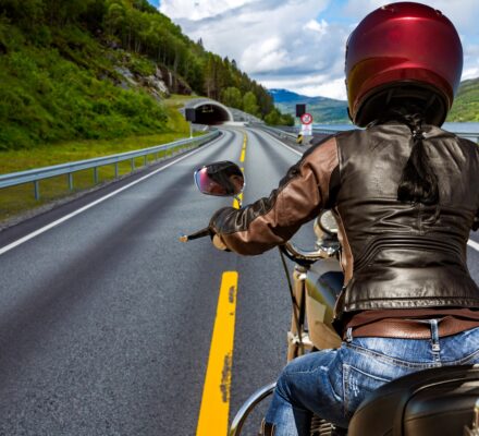 Biker girl First-person view, mountain serpentine.