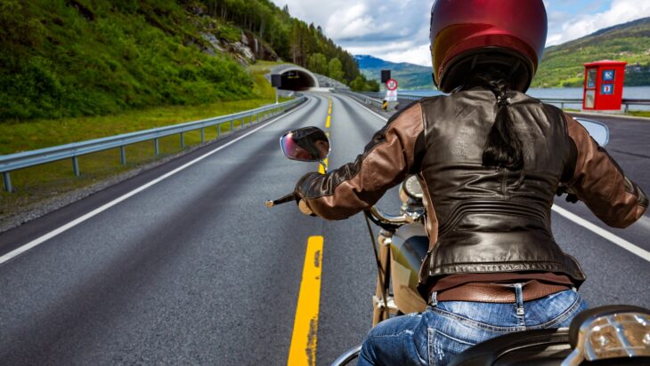 Biker girl First-person view, mountain serpentine.